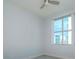 Well-lit bedroom featuring a large window and neutral decor at 1208 E Kennedy Blvd # 715, Tampa, FL 33602