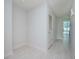 Empty hallway with light walls and tile floor at 1208 E Kennedy Blvd # 715, Tampa, FL 33602