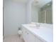 Clean bathroom with white vanity and a large mirror at 1208 E Kennedy Blvd # 715, Tampa, FL 33602