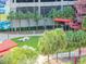 Relaxing courtyard with palm trees and seating areas at 1208 E Kennedy Blvd # 715, Tampa, FL 33602