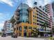 Modern building with parking and street-level businesses at 1208 E Kennedy Blvd # 715, Tampa, FL 33602