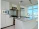 Modern kitchen with stainless steel appliances and granite countertops at 1208 E Kennedy Blvd # 715, Tampa, FL 33602