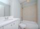 Clean bathroom with white vanity, bathtub, and shower at 1208 E Kennedy Blvd # 715, Tampa, FL 33602