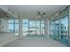 Spacious living room featuring floor to ceiling windows and city views at 1208 E Kennedy Blvd # 715, Tampa, FL 33602