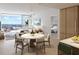Open concept dining area with marble table and city views at 111 S Ashley Dr # 3409, Tampa, FL 33602