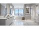 Spa-like bathroom with marble finishes and glass shower at 111 S Ashley Dr # 3409, Tampa, FL 33602