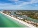 Wide aerial view of coastline, waterways, and homes at 12 Gulf Blvd # B4, Indian Rocks Beach, FL 33785