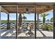 Private deck with water views and outdoor seating at 12 Gulf Blvd # B4, Indian Rocks Beach, FL 33785