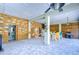 Covered patio with seating, a hammock, and a mini-fridge at 262 Banana Rd, Palm Harbor, FL 34683