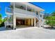 Two-story house with attached garage and elevator at 262 Banana Rd, Palm Harbor, FL 34683