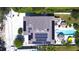 Top-down aerial view of the home's roof with solar panels, pool, and backyard layout at 262 Banana Rd, Palm Harbor, FL 34683