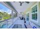 Spacious screened balcony with seating and scenic views at 262 Banana Rd, Palm Harbor, FL 34683