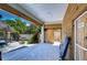 Covered patio with access to the pool and gym at 262 Banana Rd, Palm Harbor, FL 34683