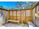 Outdoor changing room with wooden walls and benches at 262 Banana Rd, Palm Harbor, FL 34683