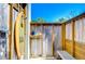 Convenient outdoor shower with surfboard accents at 262 Banana Rd, Palm Harbor, FL 34683