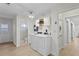 Laundry room features washer, dryer, and additional storage at 3111 E Vina Del Mar Blvd, St Pete Beach, FL 33706