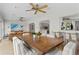 Spacious dining area with views into the living room and kitchen at 3111 E Vina Del Mar Blvd, St Pete Beach, FL 33706