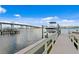 Private boat dock with lift and walkway, offering convenient water access at 3111 E Vina Del Mar Blvd, St Pete Beach, FL 33706