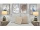 Cozy bedroom with water views and neutral decor at 3111 E Vina Del Mar Blvd, St Pete Beach, FL 33706