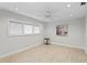 Bright bedroom with hardwood floors and neutral walls at 3111 E Vina Del Mar Blvd, St Pete Beach, FL 33706