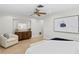 Bright bedroom with hardwood floors and stylish decor at 3111 E Vina Del Mar Blvd, St Pete Beach, FL 33706