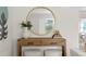 Entryway features a console table with mirror and decor at 3111 E Vina Del Mar Blvd, St Pete Beach, FL 33706
