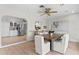 Open dining area with wood table and kitchen views at 3111 E Vina Del Mar Blvd, St Pete Beach, FL 33706
