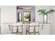 Breakfast bar with seating and stainless steel appliances at 3111 E Vina Del Mar Blvd, St Pete Beach, FL 33706