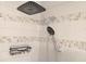 Updated shower with dual shower heads and modern tile at 3118 Palm Ct, Dunedin, FL 34698