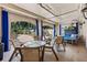 Relaxing community patio with seating area and pool view at 501 Knights Run Ave # 1215, Tampa, FL 33602