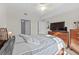 Spacious bedroom with ample closet space and a ceiling fan at 501 Knights Run Ave # 1215, Tampa, FL 33602