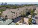 Community building exterior with parking and fountain at 501 Knights Run Ave # 1215, Tampa, FL 33602