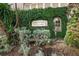 Harbour Place City Homes building signage with lush greenery at 501 Knights Run Ave # 1215, Tampa, FL 33602