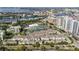 Aerial view of waterfront community with tennis courts and resort-style amenities at 501 Knights Run Ave # 1215, Tampa, FL 33602