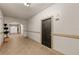 Building hallway with tile floors and access to unit 1215 at 501 Knights Run Ave # 1215, Tampa, FL 33602