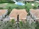 Luxury townhomes with tile roofs near golf course at 1361 Emerald Dunes, Sun City Center, FL 33573