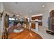 Open kitchen with granite countertops and island at 1361 Emerald Dunes, Sun City Center, FL 33573