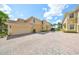 Luxury townhome with attached garage and paved driveway at 1361 Emerald Dunes, Sun City Center, FL 33573