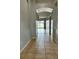 Tile entryway with view into the living room and kitchen at 1127 Barclay Wood Dr, Ruskin, FL 33570