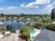 Residential area with canal, houses, and boats at 625 80Th Ave, St Pete Beach, FL 33706