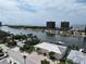 Aerial view of waterfront home with private driveway and canal access at 625 80Th Ave, St Pete Beach, FL 33706