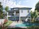 Two-story house with a pool and a landscaped backyard at 625 80Th Ave, St Pete Beach, FL 33706