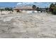 Vacant lot, view of canal and houses at 625 80Th Ave, St Pete Beach, FL 33706