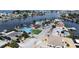 Aerial view of waterfront homes and canals at 625 80Th Ave, St Pete Beach, FL 33706