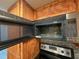 Empty microwave interior with turntable in place at 10911 Oldham Rd, Port Richey, FL 34668