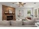 Living room features a brick fireplace and comfortable seating at 2820 N Central Ct, Tampa, FL 33602