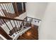 Elegant staircase with dark wood and black metal railings at 2820 N Central Ct, Tampa, FL 33602