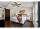 Spacious bedroom with vaulted ceilings and barn door at 2820 N Central Ct, Tampa, FL 33602