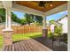 Relaxing back porch features a ceiling fan and overlooks the backyard at 2820 N Central Ct, Tampa, FL 33602