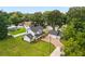 Aerial view of a two-story house with a detached garage and large yard at 2820 N Central Ct, Tampa, FL 33602